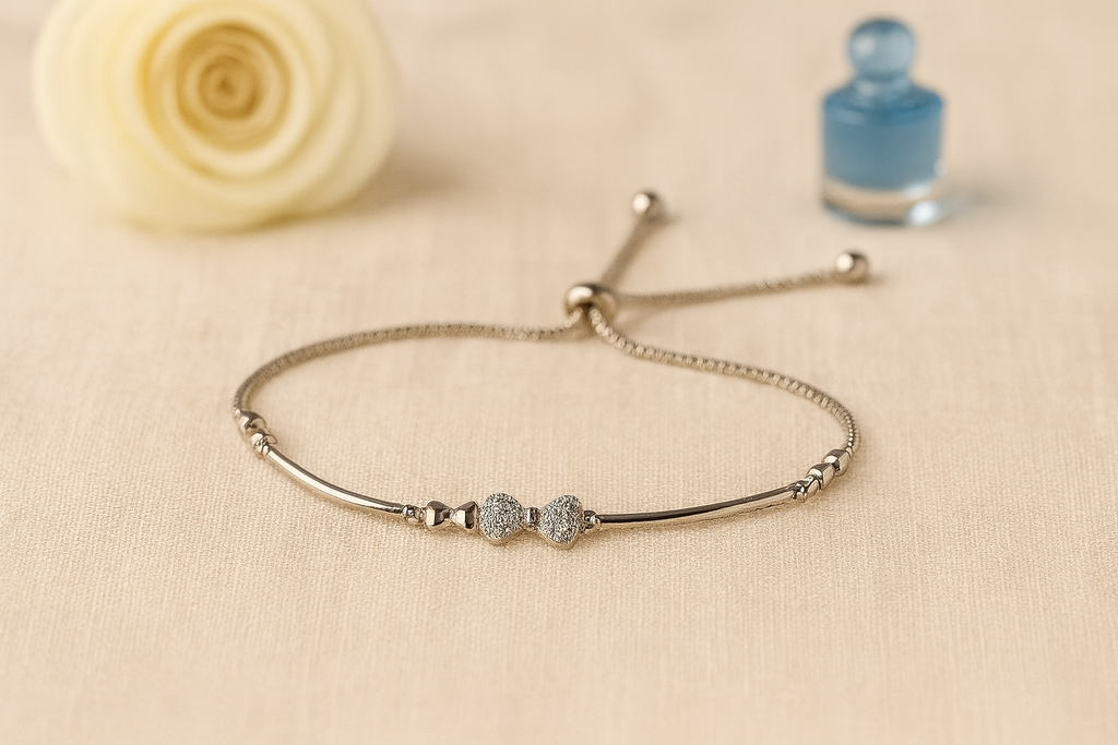 Bow Charm Bracelet – Silver Elegance with Sparkling Bow