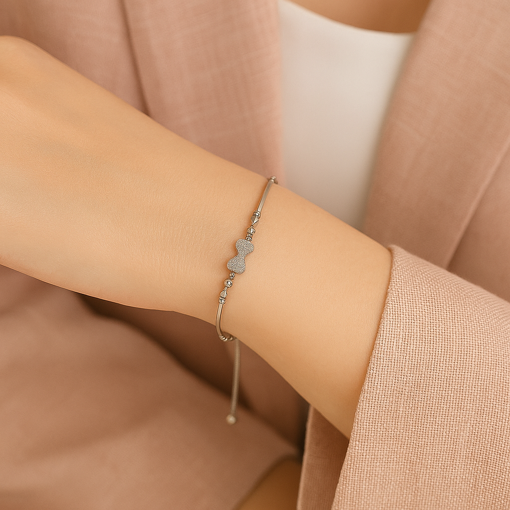 Bow Charm Bracelet – Silver Elegance with Sparkling Bow